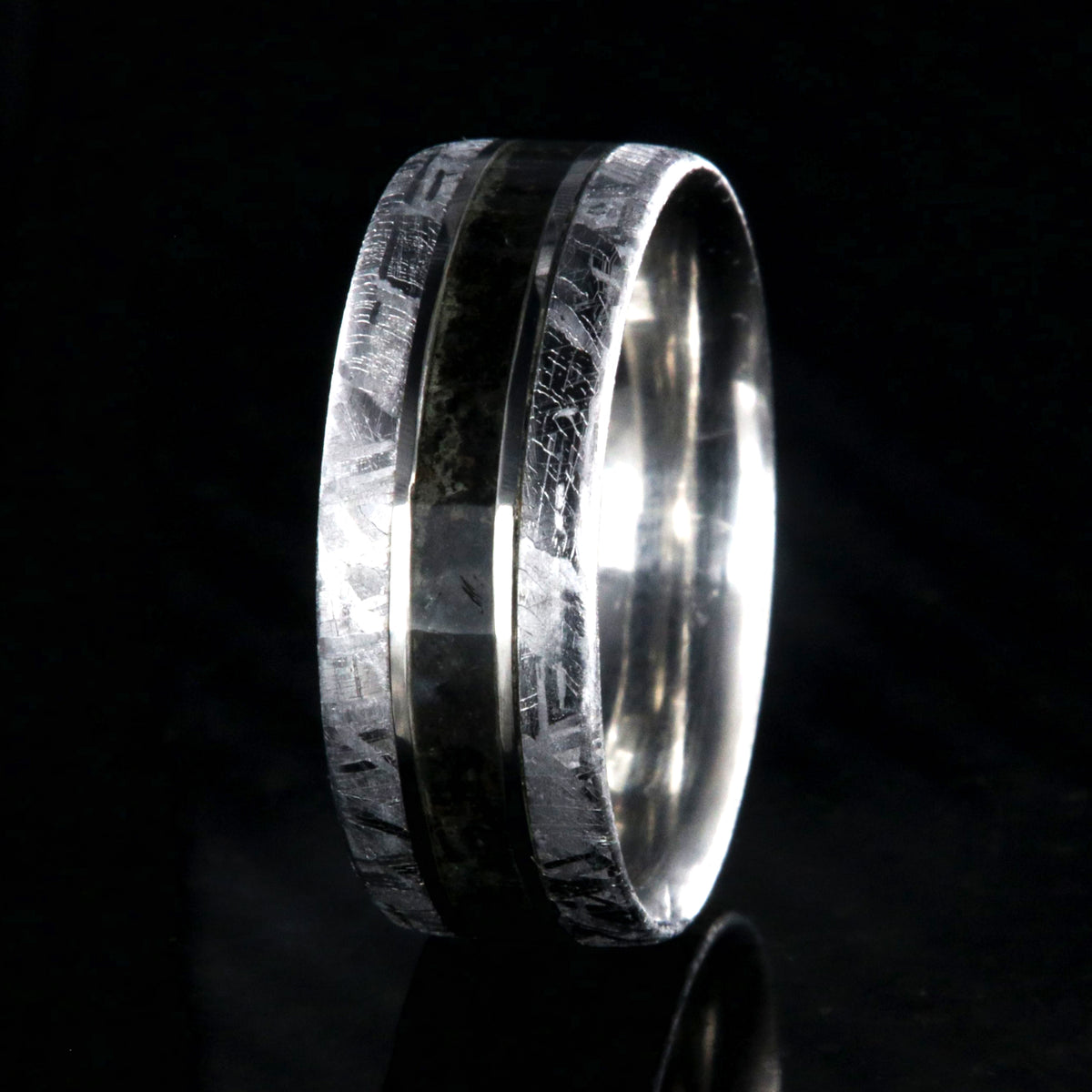 8mm wide cobalt ring with meteorite edges and dinosaur bone center inlay