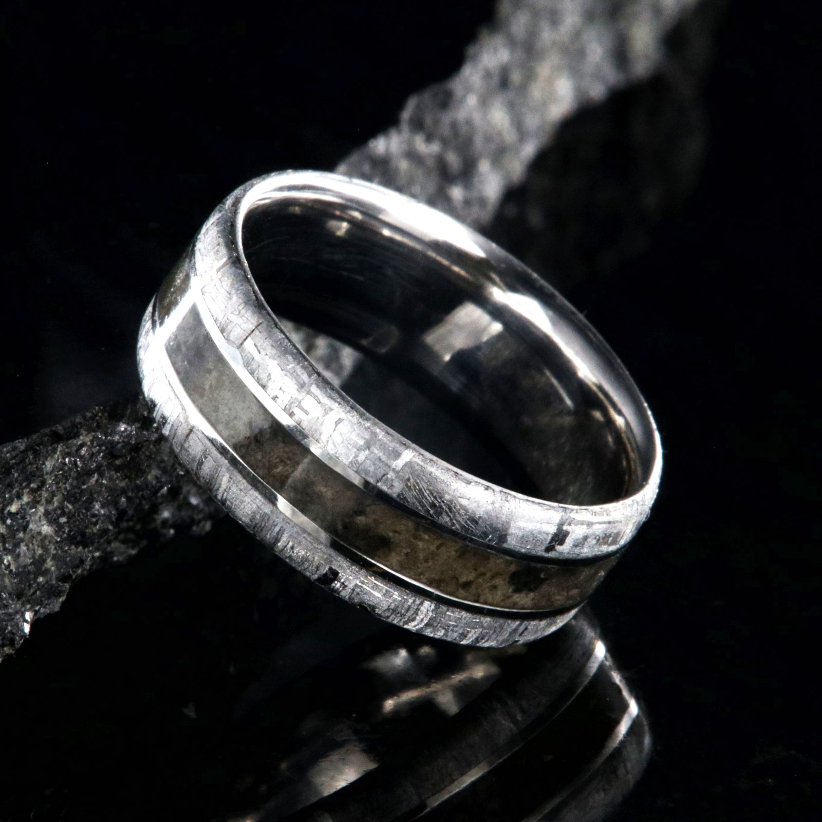 8mm wide cobalt wedding band for men with meteorite edges and dinosaur bone fossil center inlay