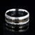 8mm wide cobalt wedding band for men with meteorite edges and dinosaur bone fossil center inlay