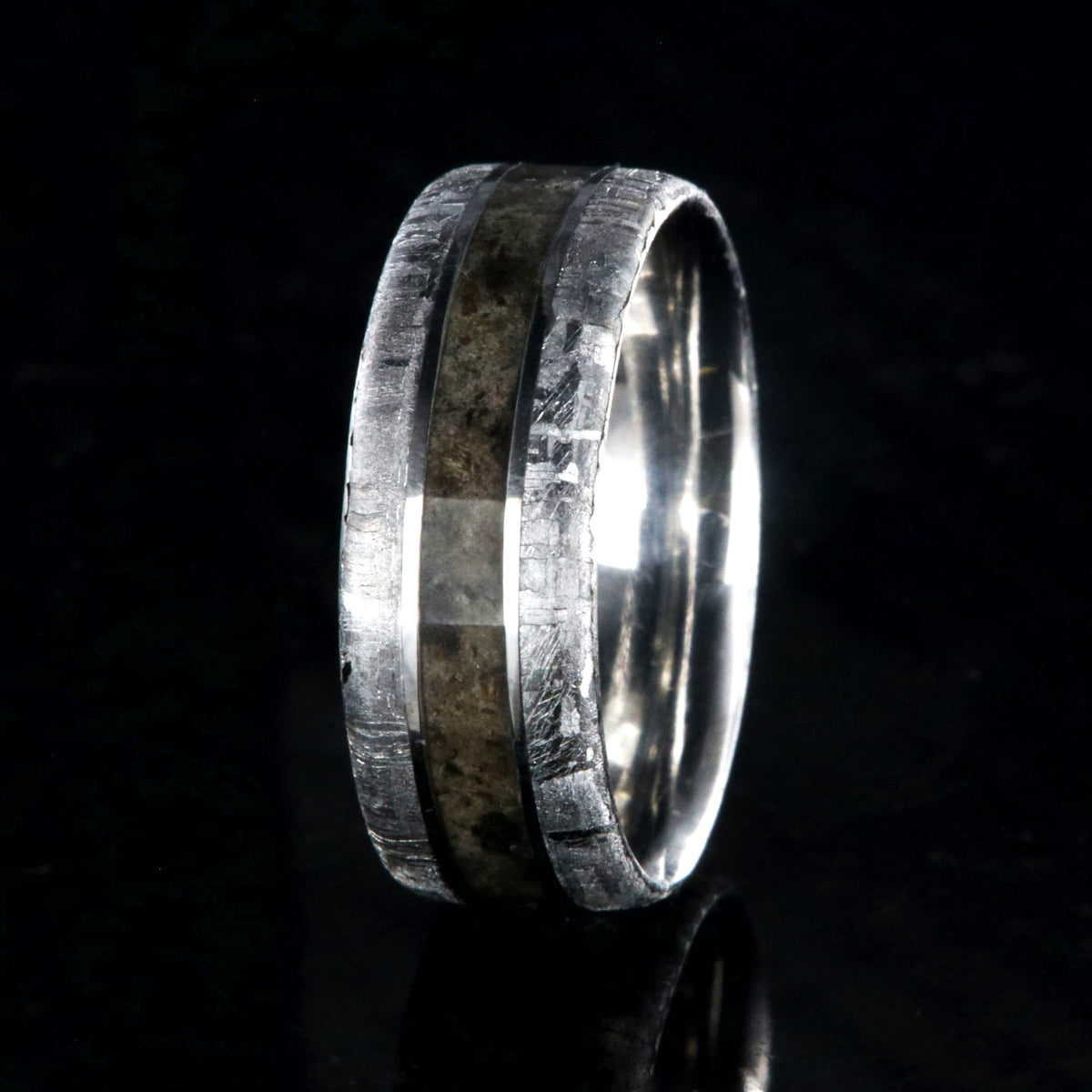 8mm wide cobalt wedding band for men with meteorite edges and dinosaur bone fossil center inlay