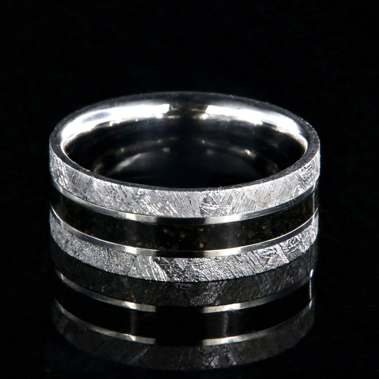 9mm wide men's wedding band with a dark dinosaur bone center inlay, Gibeon meteorite edges, and a flat profile