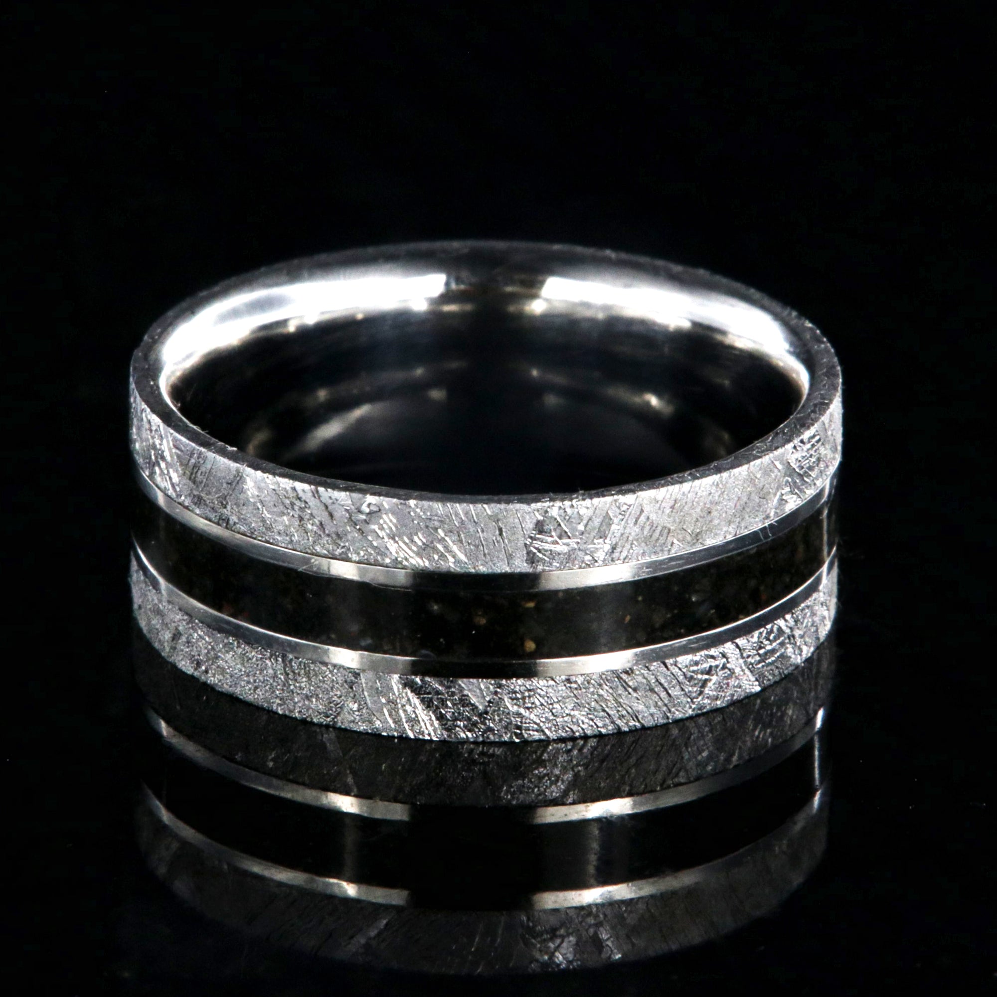 9mm wide men's wedding band with a dark dinosaur bone center inlay, Gibeon meteorite edges, and a flat profile