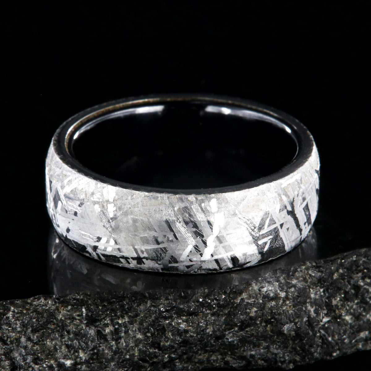 8mm wide Gibeon meteorite ring with black titanium sleeve and rounded profile