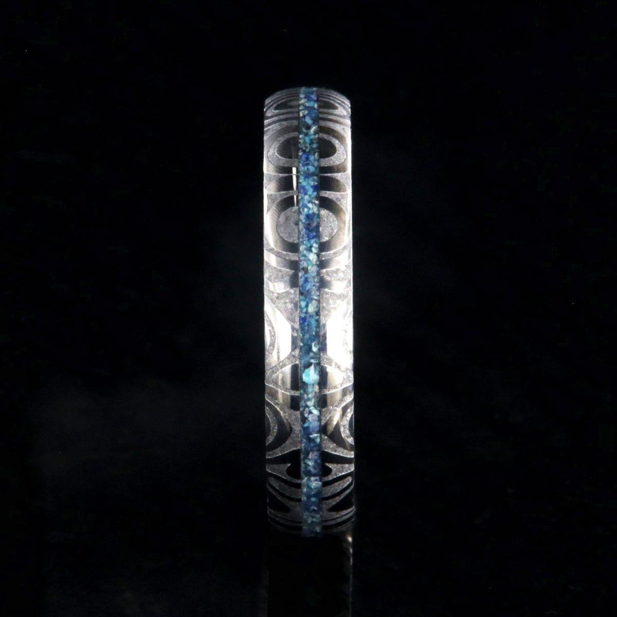 4mm wide Damascus steel ring with a turquoise and lapis lazuli inlay and a rounded profile