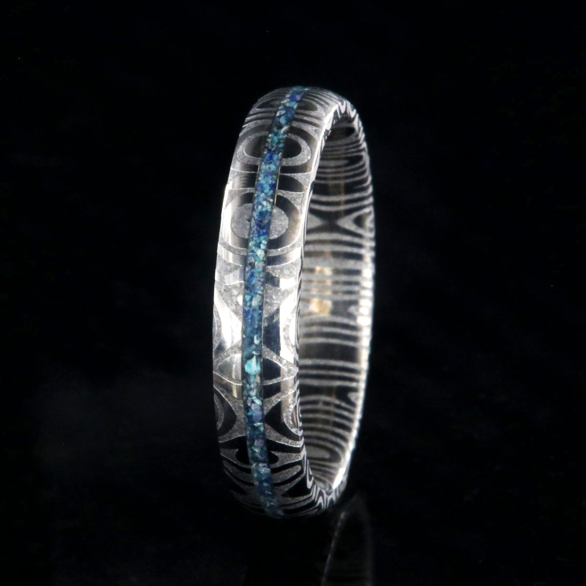 4mm wide Damascus steel ring with a turquoise and lapis lazuli inlay and a rounded profile