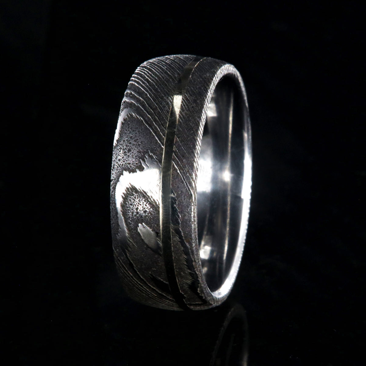 8mm wide Damascus steel ring with white gold inlay