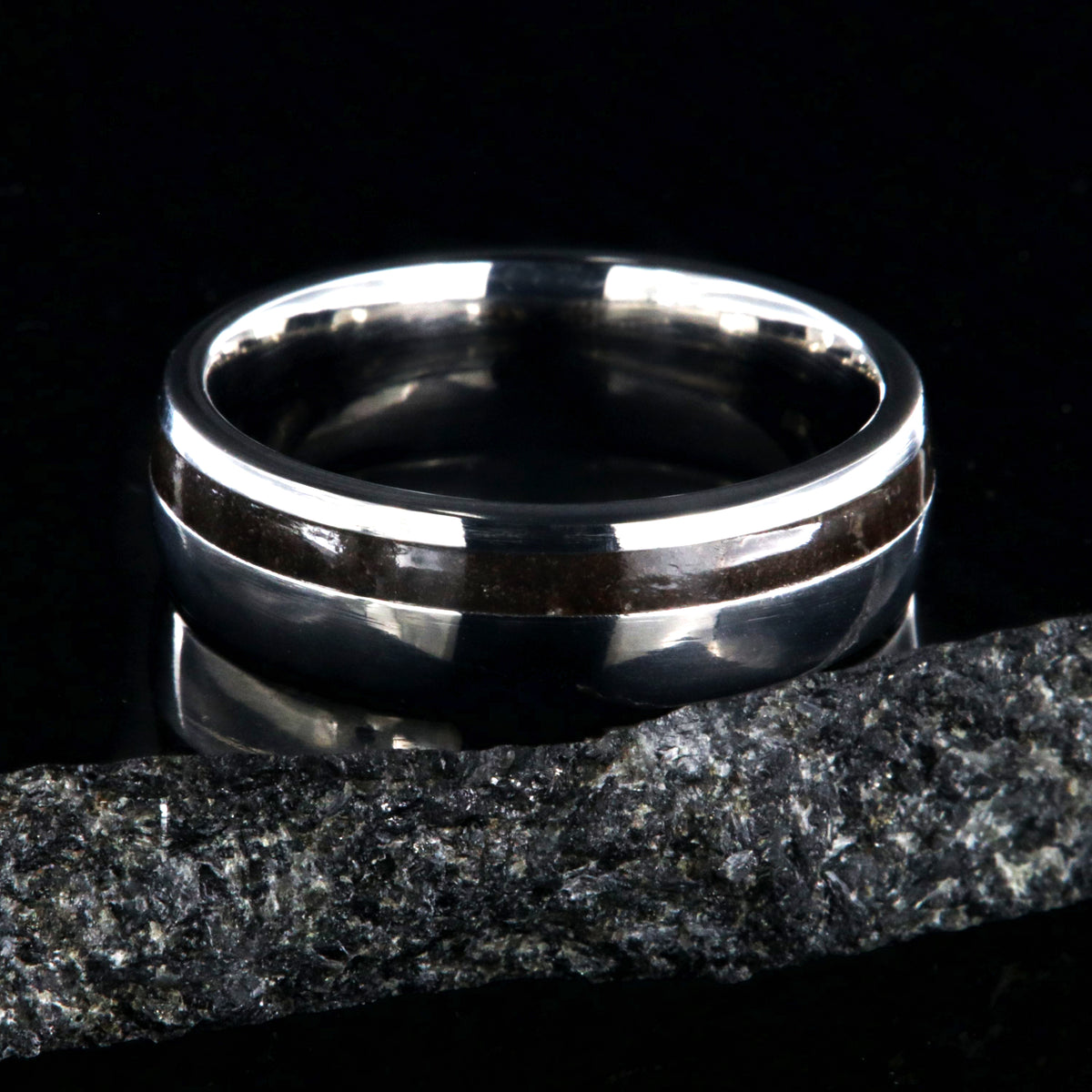 7mm wide titanium wedding band with dinosaur bone inlay