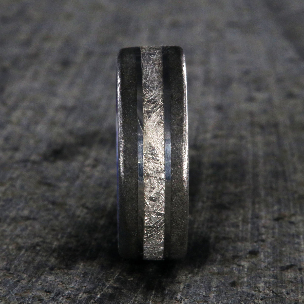 8mm wide meteorite and stardust ring with purple-blue sleeve
