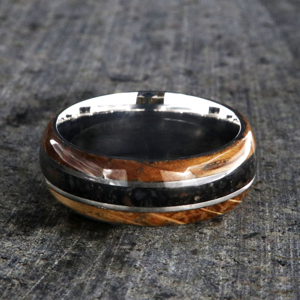 8mm wide cobalt wedding band with a center dinosaur bone inlay and whiskey barrel edges