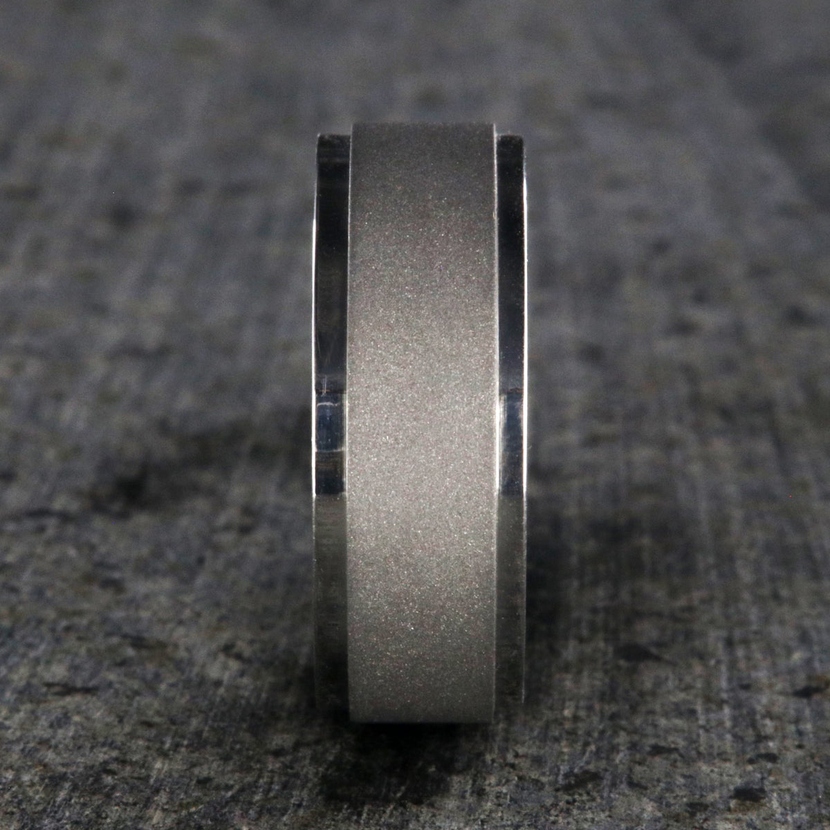 8mm wide cobalt wedding band with a raised-center and sandblasted finish