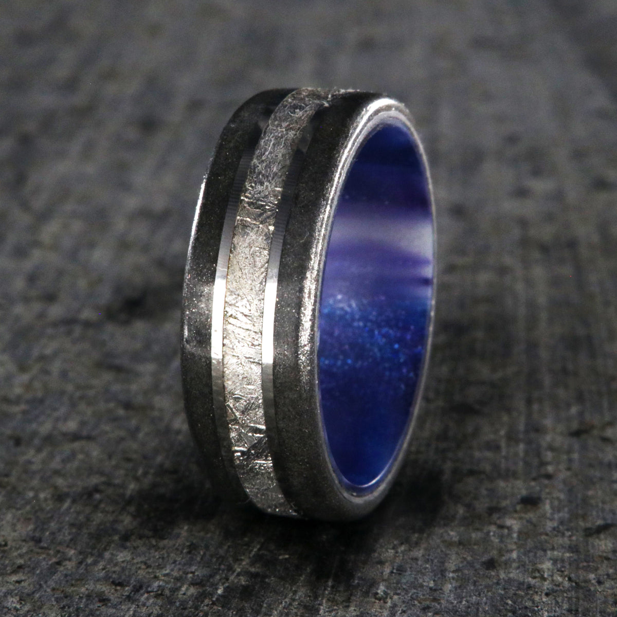 8mm wide meteorite and stardust ring with purple-blue sleeve