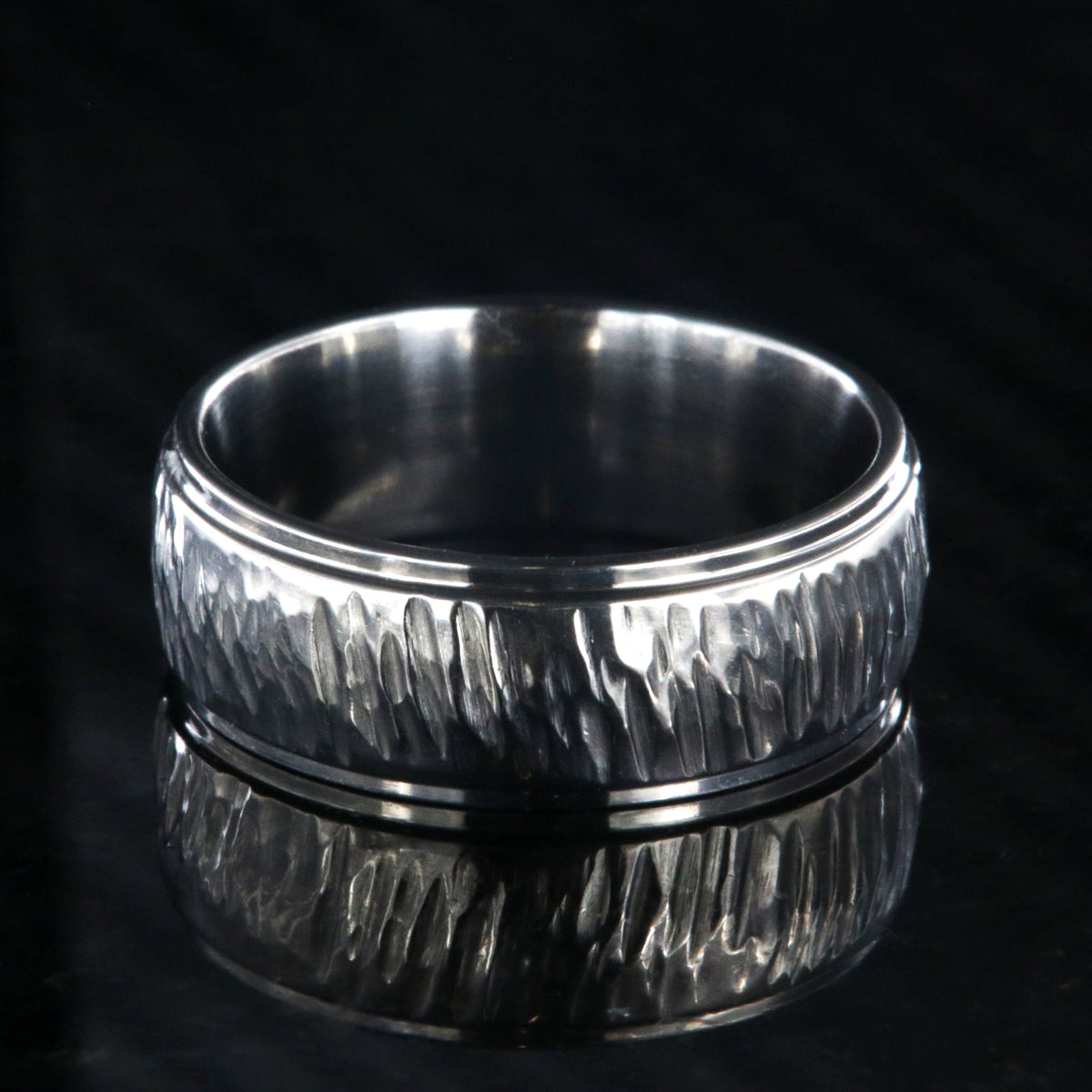 8mm wide titanium wedding band with a tree bark raised center