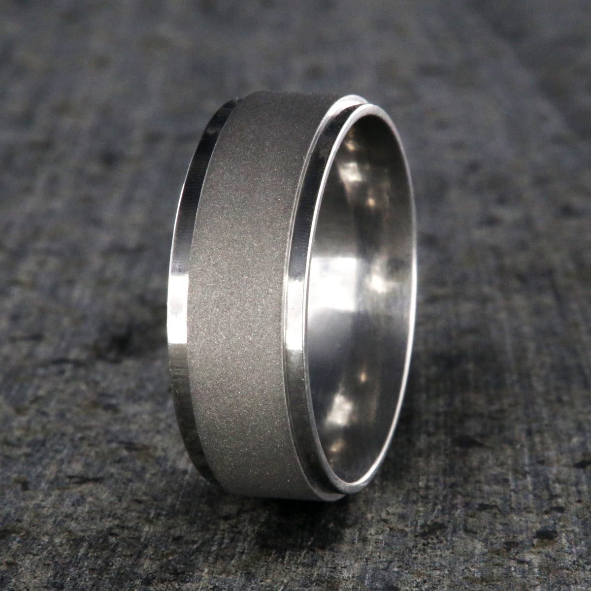 8mm wide cobalt wedding band with a raised-center and sandblasted finish