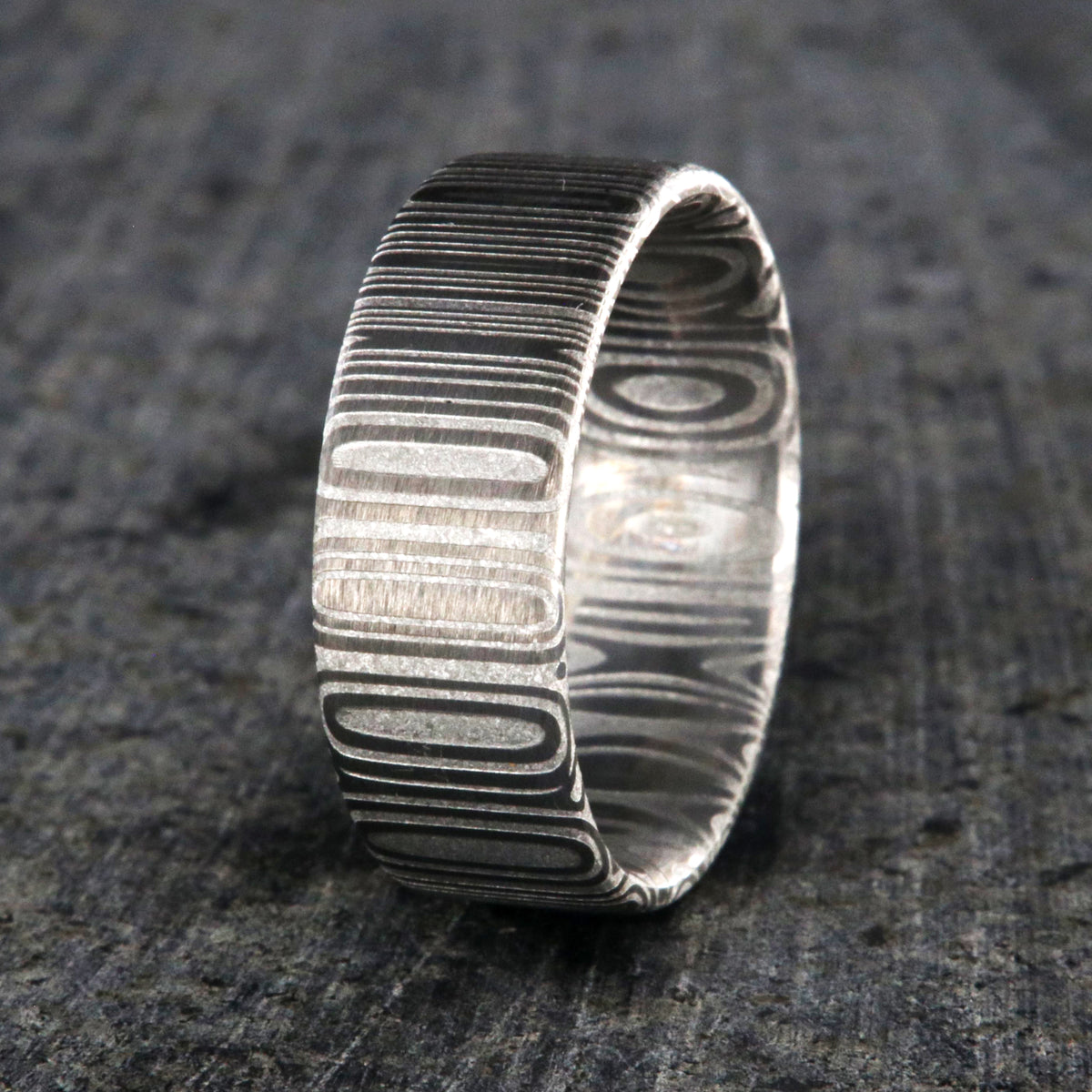 8mm wide Damascus steel wedding band with flat profile