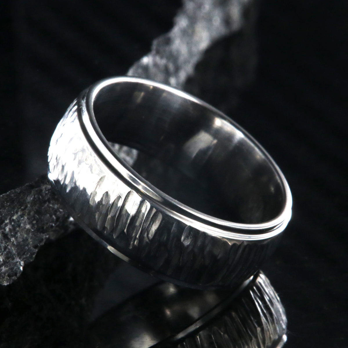 8mm wide titanium wedding band with a tree bark raised center