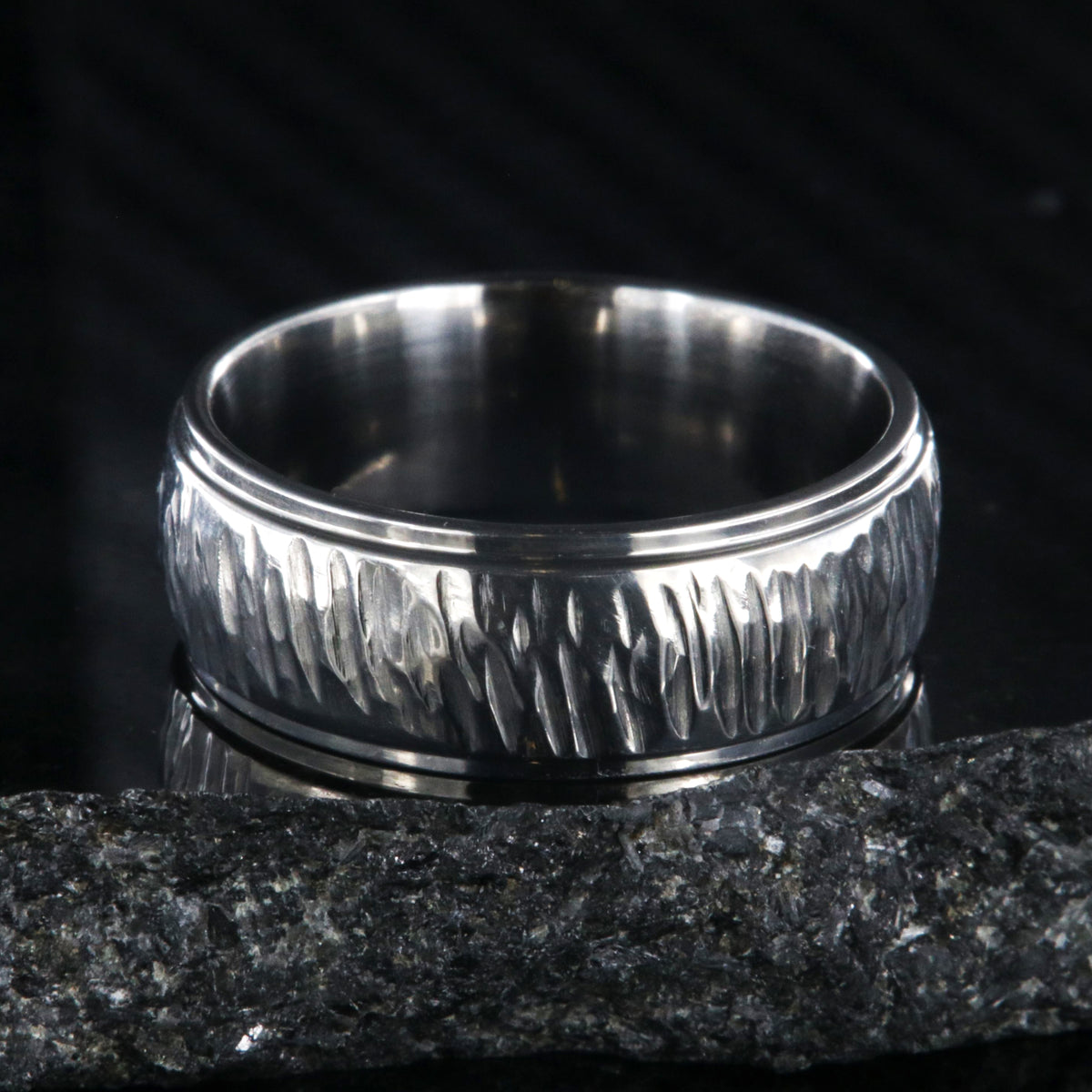 8mm wide titanium wedding band with a tree bark raised center