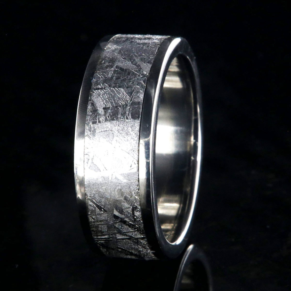 7mm wide Gibeon meteorite ring with titanium edges and sleeve