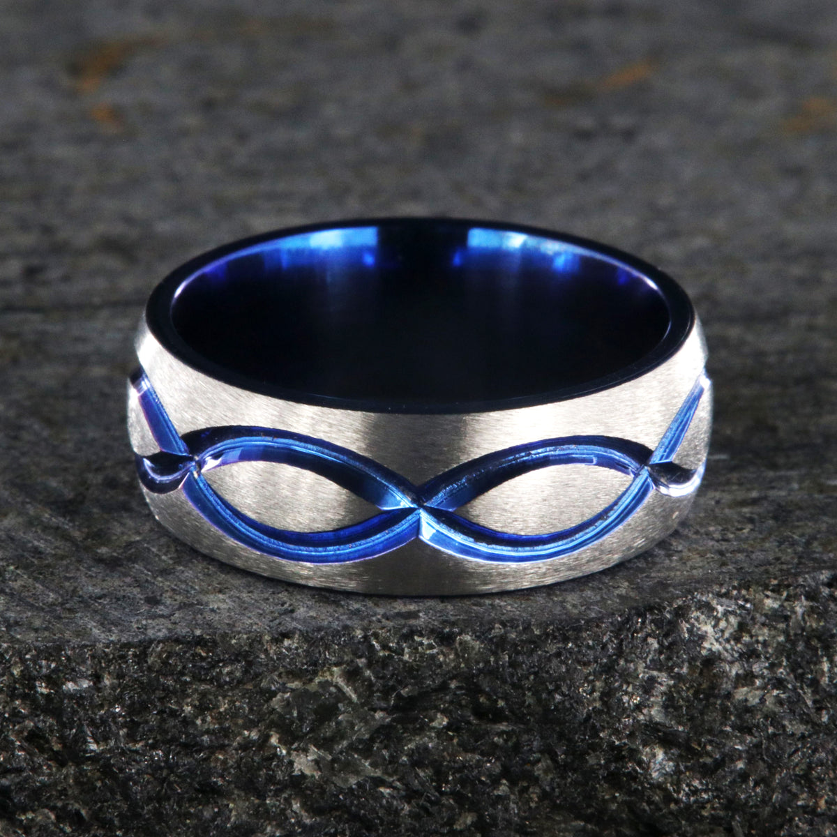 8mm wide titanium wedding band with a blue infinity design and blue sleeve