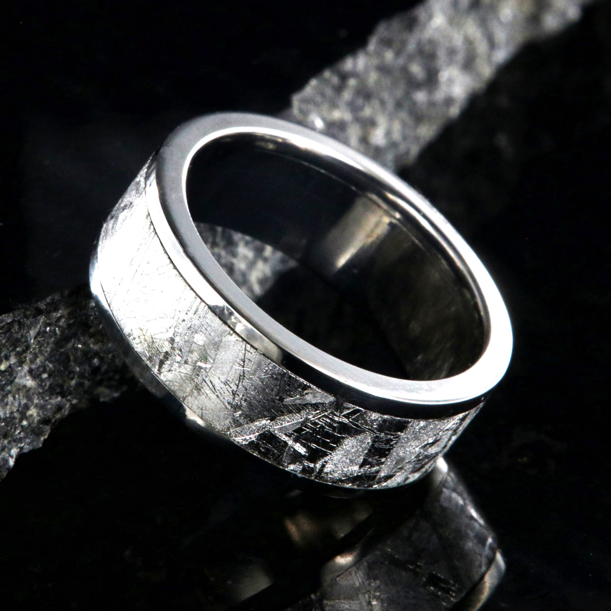7mm wide women&#39;s meteorite wedding band with titanium edges and sleeve