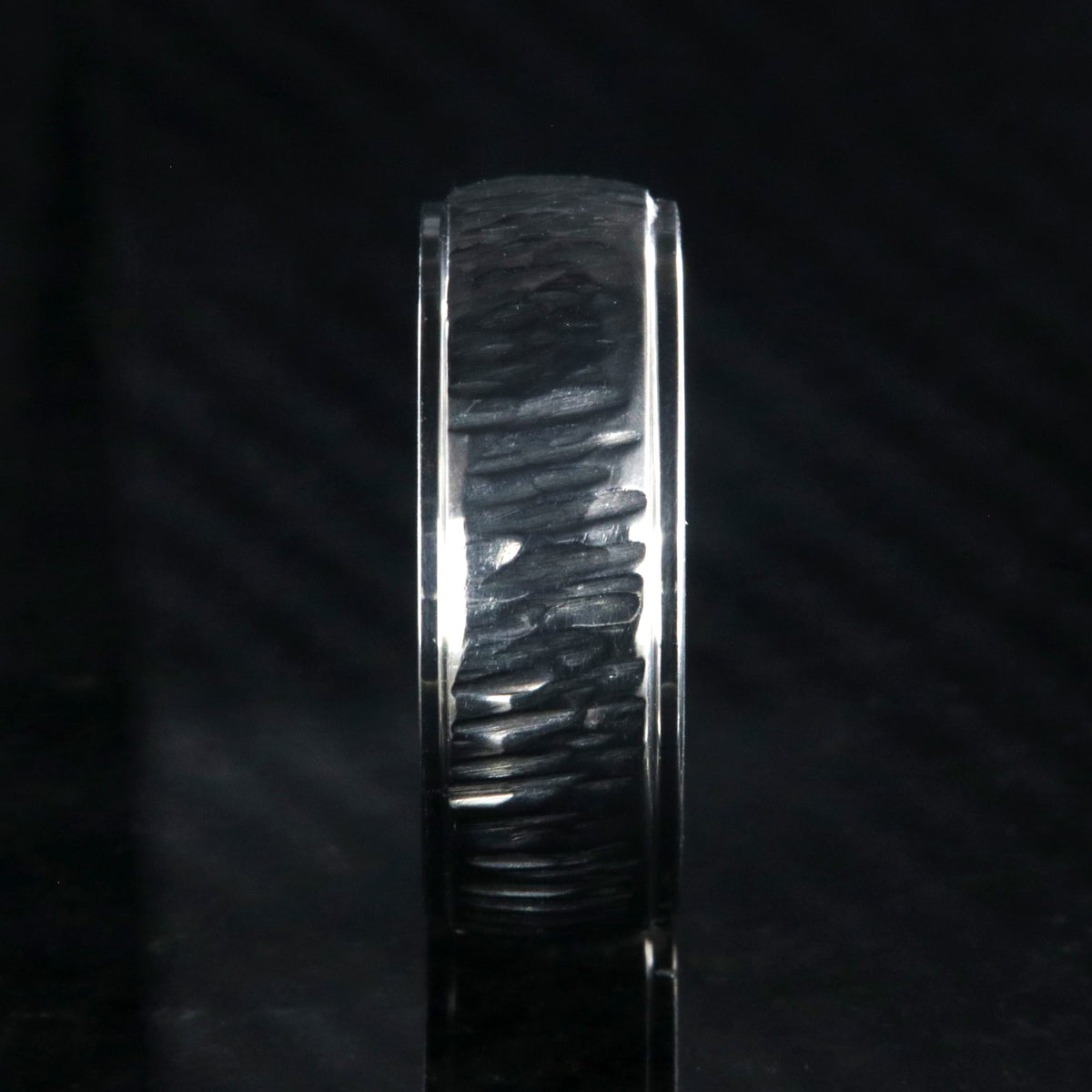 8mm wide titanium wedding band with a tree bark raised center