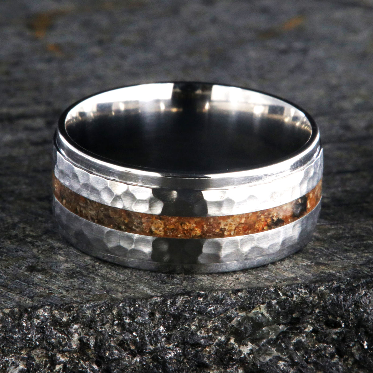 9mm wide titanium wedding band with a dinosaur bone inlay, raised center, and hammered texture