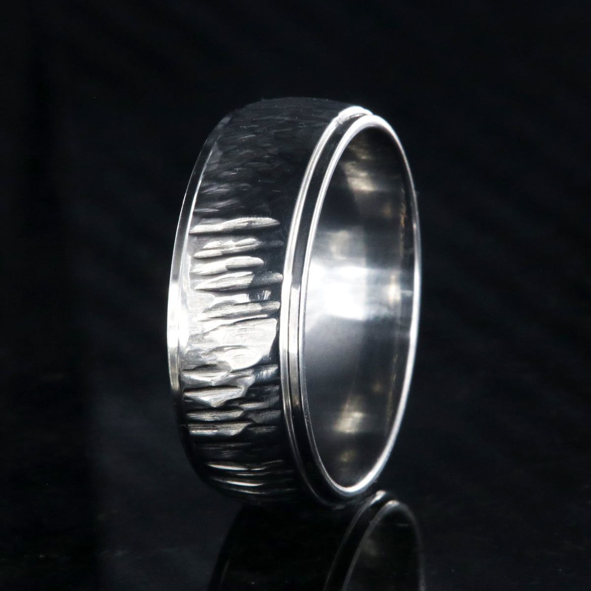 8mm wide titanium wedding band with a tree bark raised center