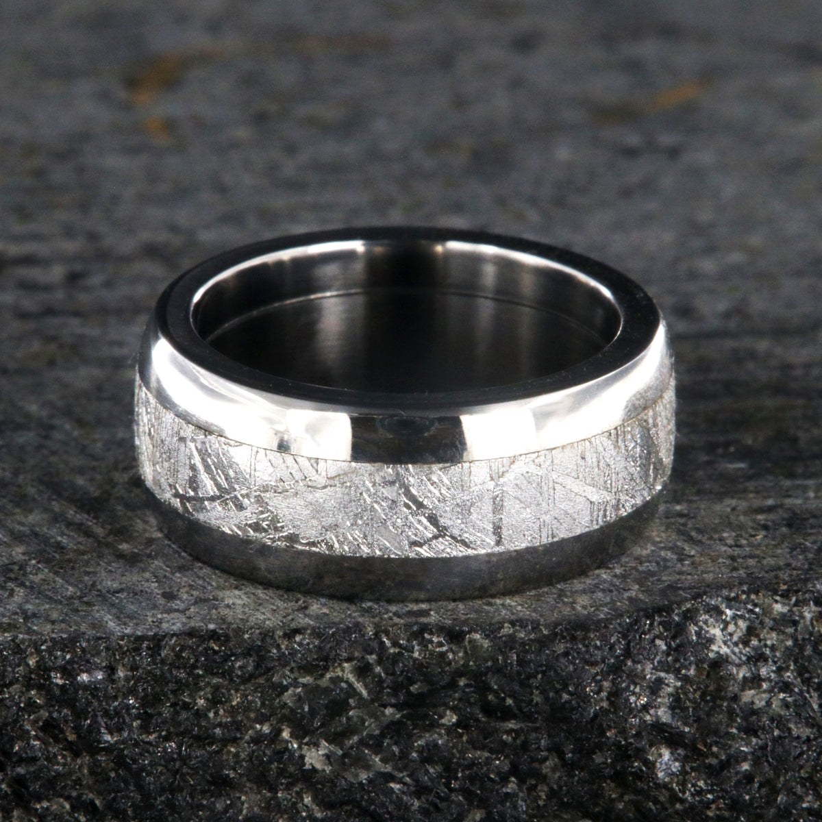 8mm wide Muonionalusta meteorite wedding band with titanium edges and sleeve
