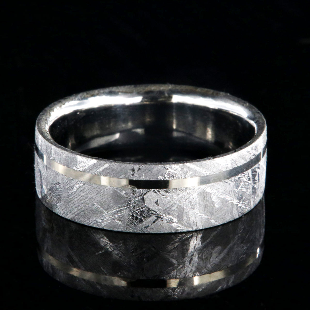 8mm wide men&#39;s meteorite wedding band with an off-centered white gold inlay, polished cobalt sleeve, and flat profile
