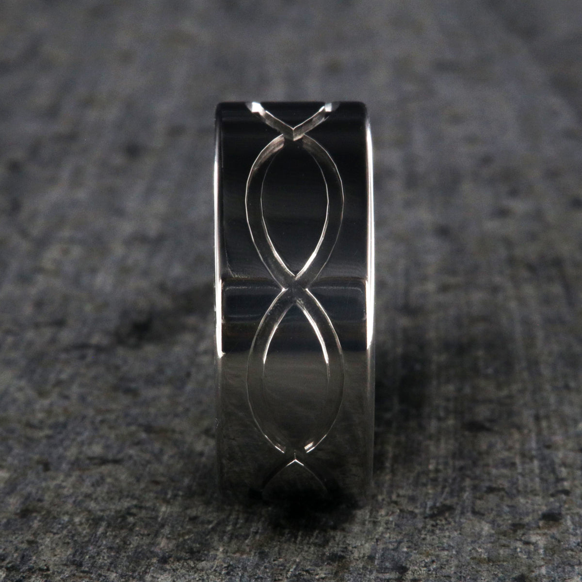 9mm wide titanium wedding band with a milled infinity design and flat profile