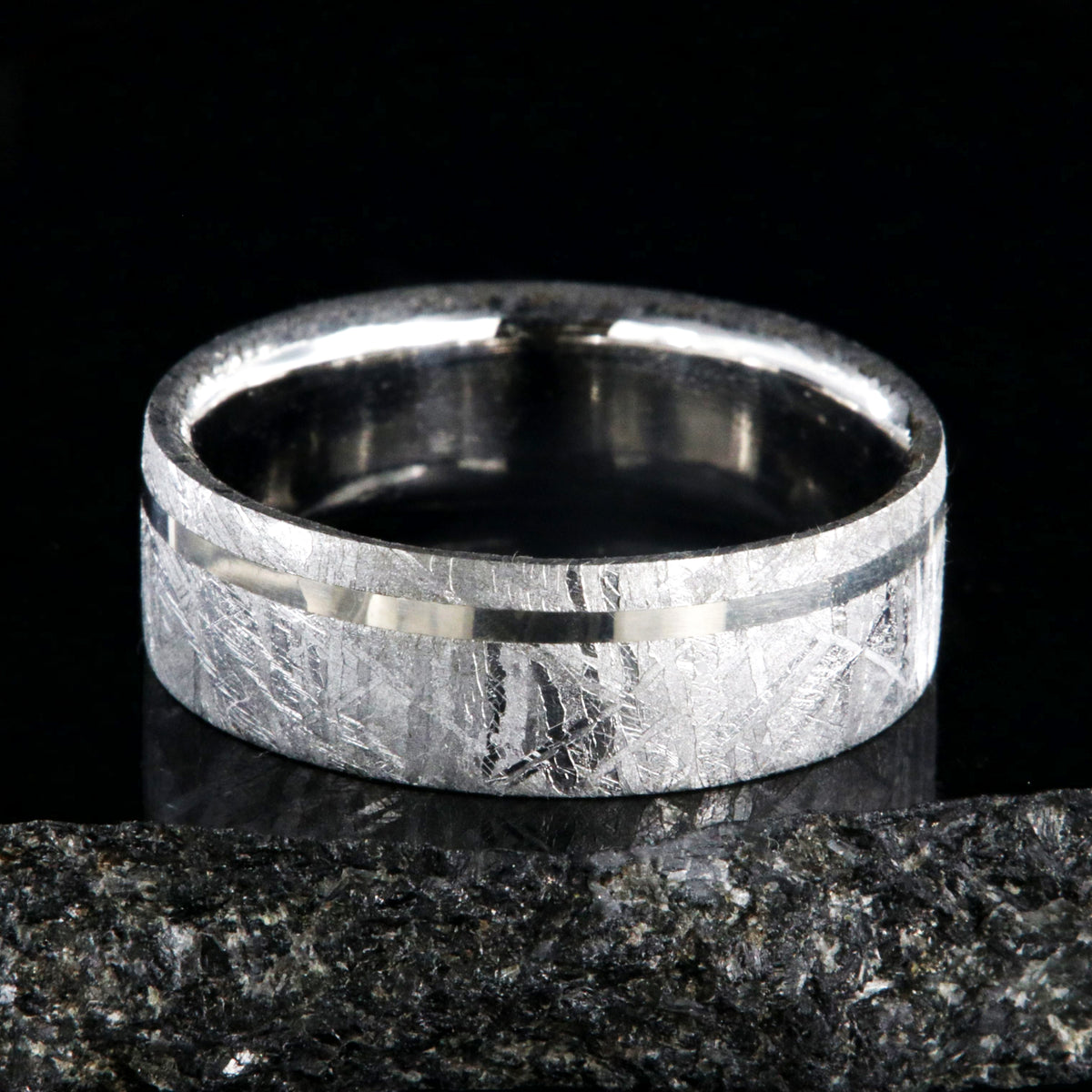 8mm wide men&#39;s meteorite wedding band with an off-centered white gold inlay, polished cobalt sleeve, and flat profile