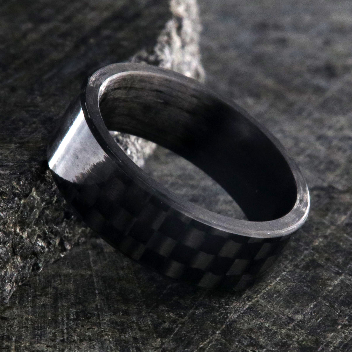 7mm wide black carbon fiber ring with a flat profile