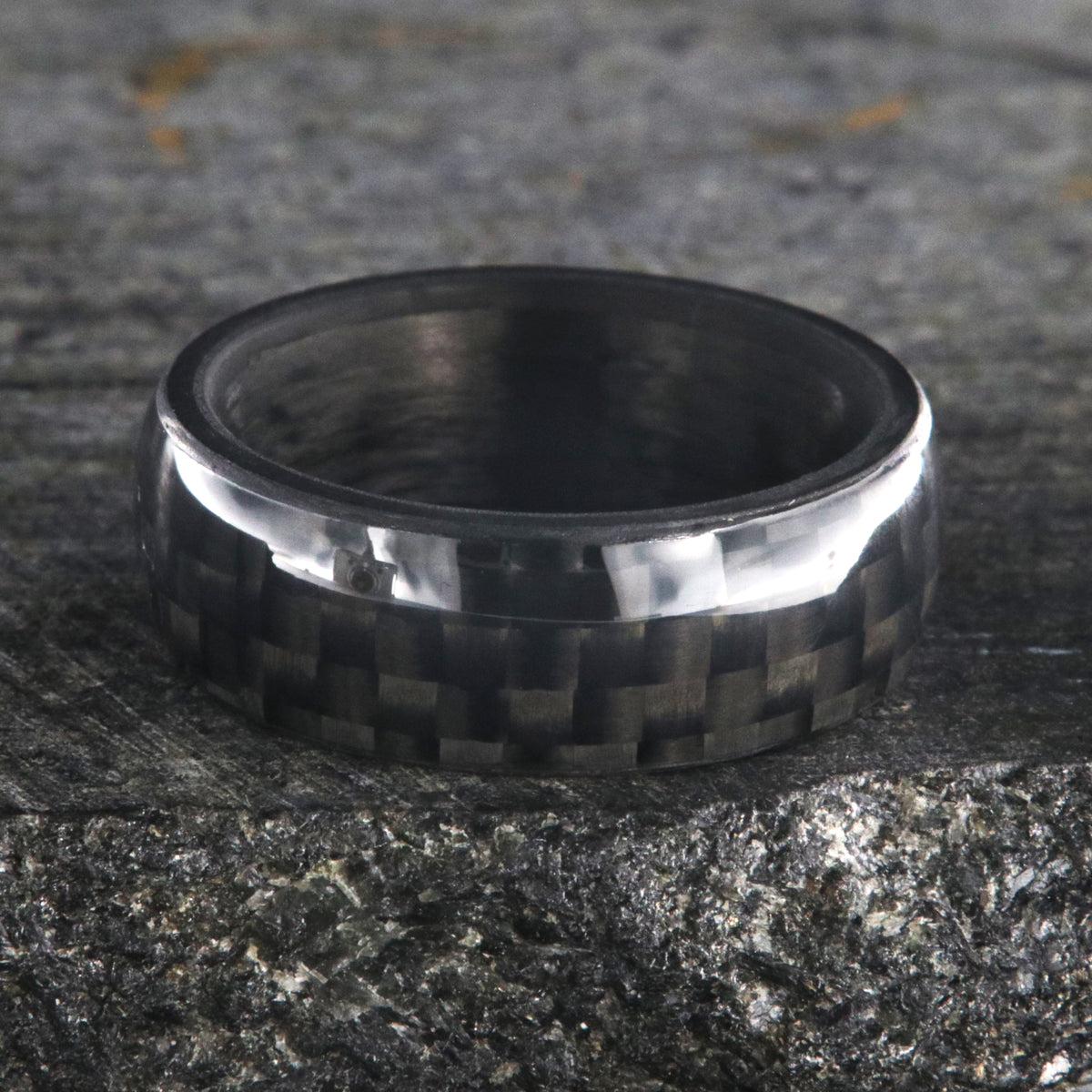 8mm wide black carbon fiber ring with a rounded profile