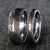 8mm and 4mm wide Damascus steel wedding ring set with a hammered finish and centered rose gold inlay