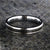 4mm wide stardust promise ring with titanium edges and sleeve