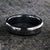 6mm wide stardust ring set with black zirconium edges and sleeve
