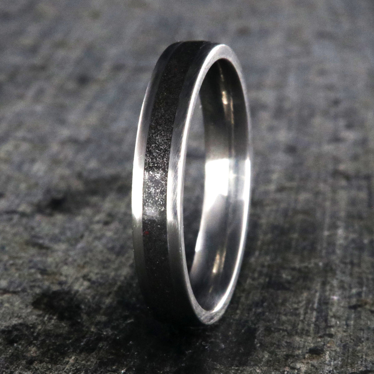 4mm wide stardust promise ring with titanium edges and sleeve