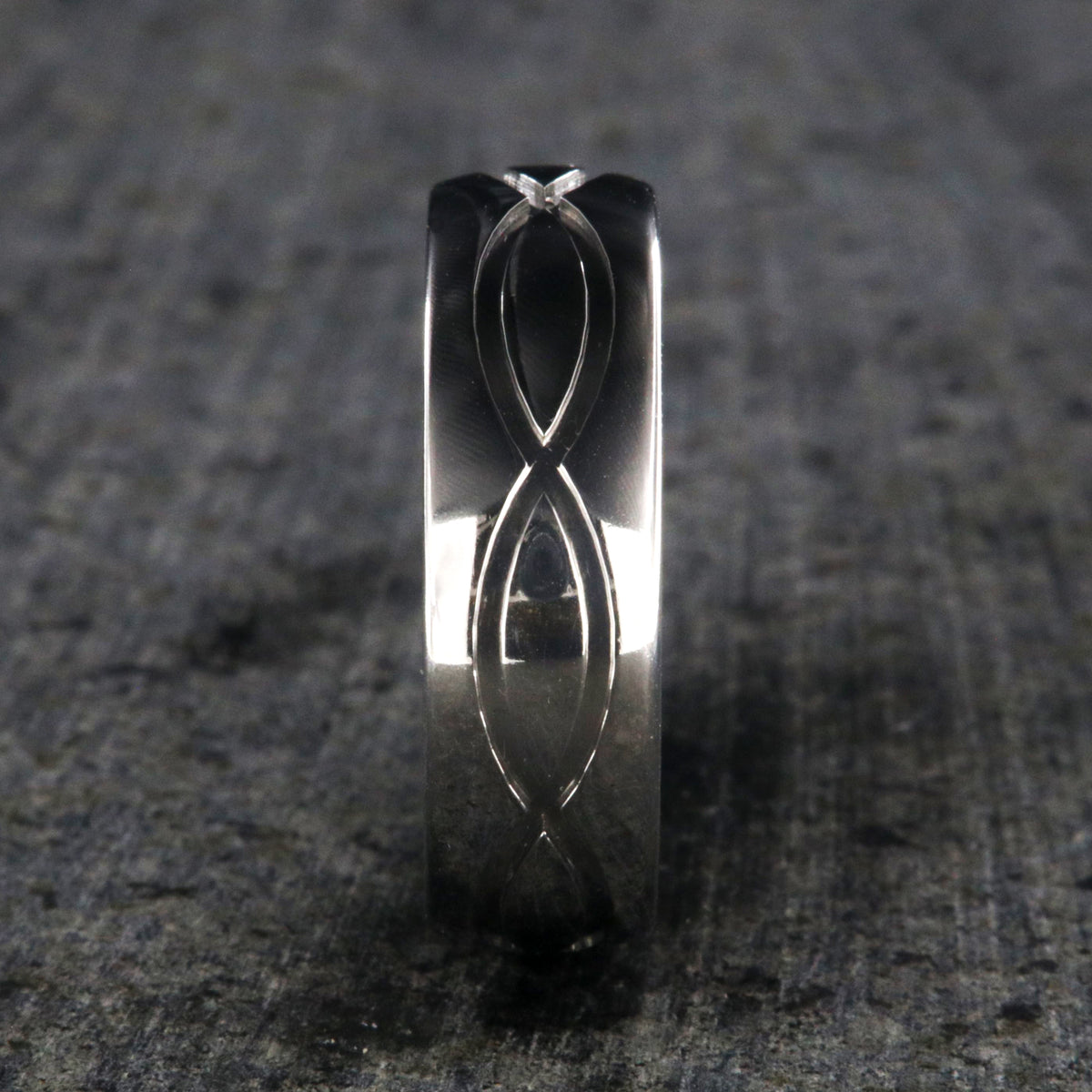 7mm wide infinity titanium wedding band with a rounded profile