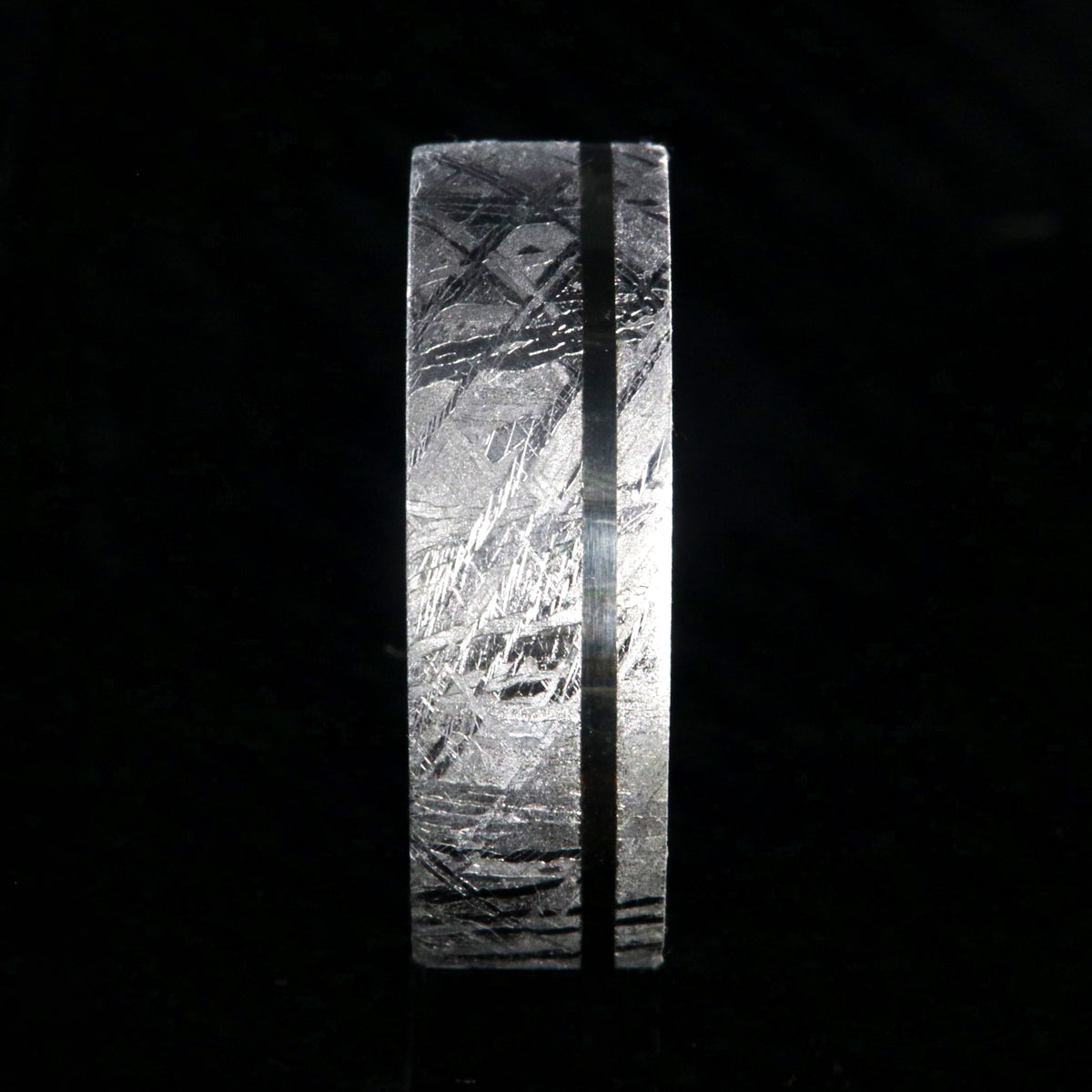 8mm wide men&#39;s meteorite wedding band with an off-centered white gold inlay, polished cobalt sleeve, and flat profile