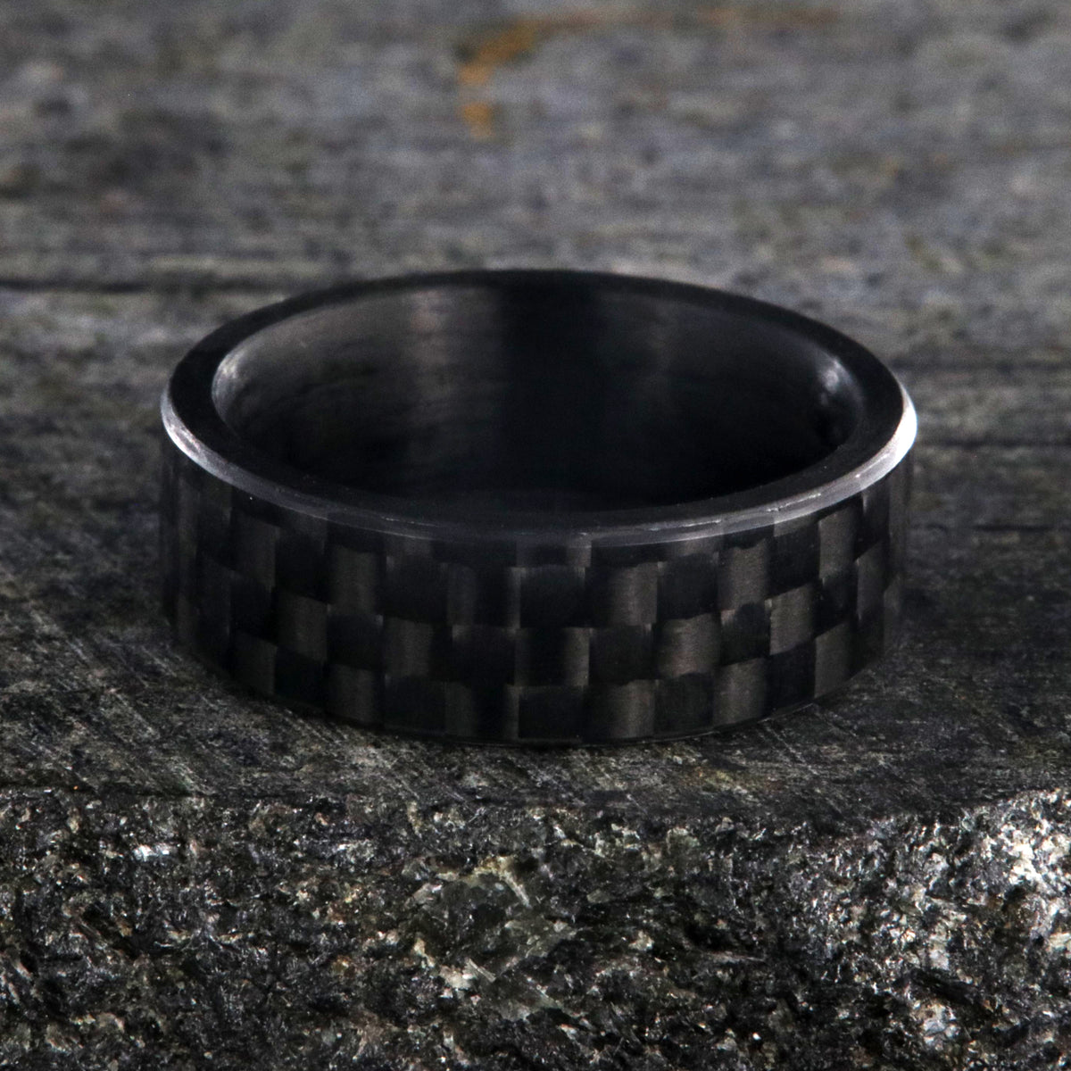 7mm wide black carbon fiber ring with a flat profile