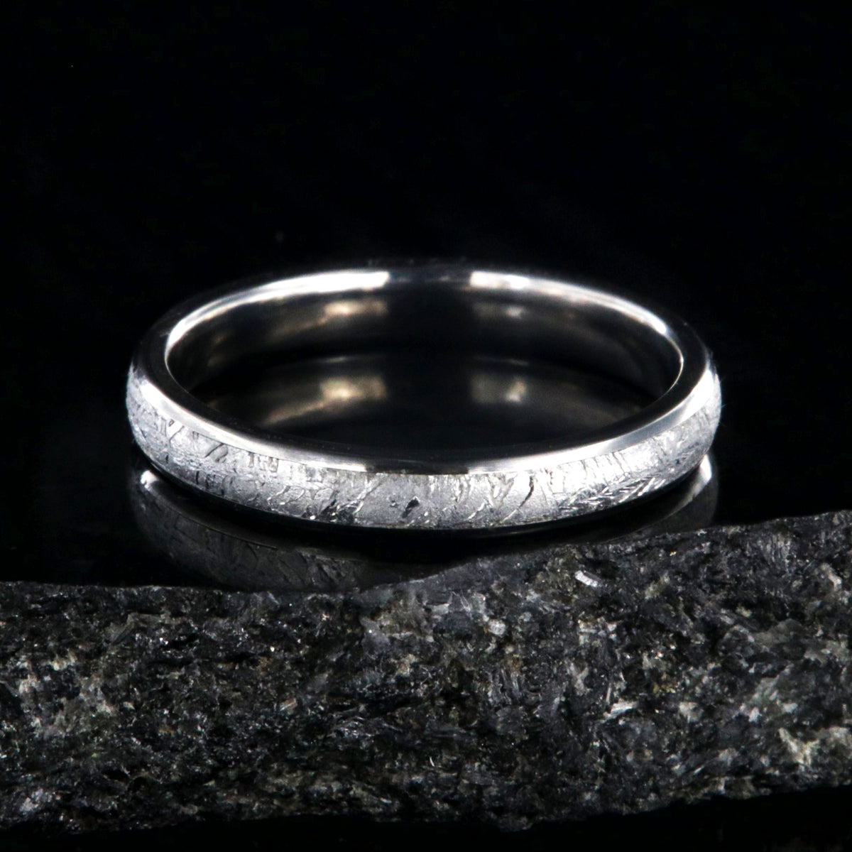 3mm wide Gibeon meteorite wedding band for women with titanium edges and sleeve