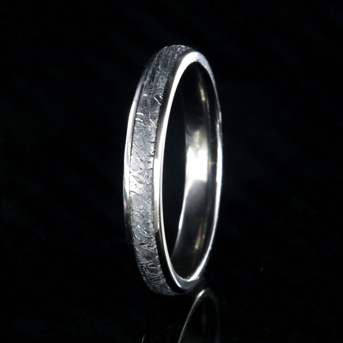 3mm wide Gibeon meteorite wedding band for women with titanium edges and sleeve