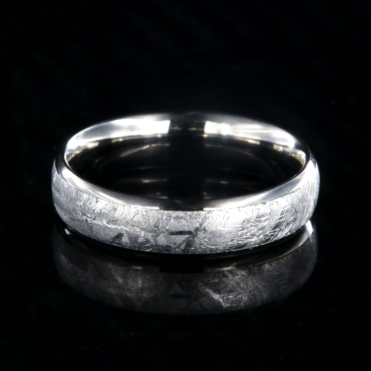 6mm wide Gibeon meteorite wedding band for women with titanium edges and sleeve