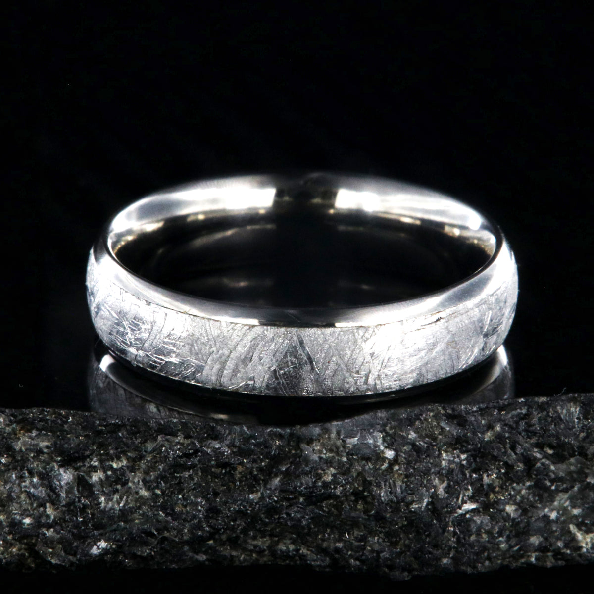 6mm wide meteorite ring with rounded profile and titanium edges and sleeve