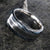 9mm wide stardust center ring with blue and black swirled cobaltium mokume edges