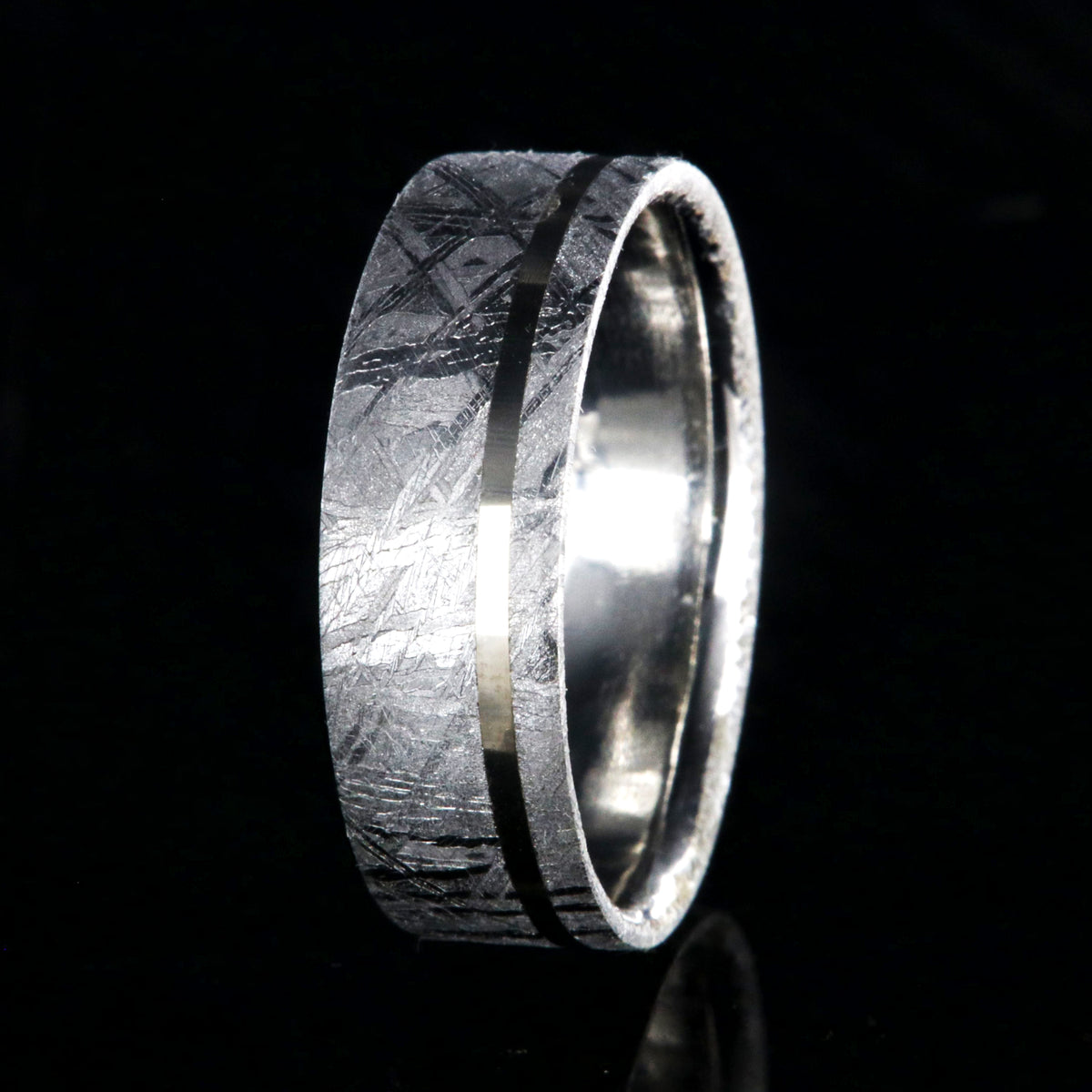 8mm wide men&#39;s meteorite wedding band with an off-centered white gold inlay, polished cobalt sleeve, and flat profile
