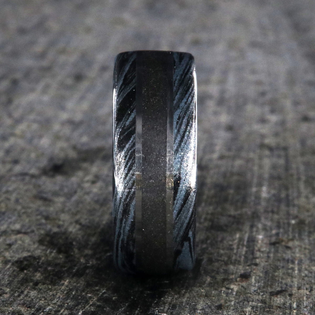 9mm wide stardust center ring with blue and black swirled cobaltium mokume edges