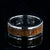7mm wide wedding band with titanium edges and a whiskey barrel sleeve