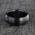 8mm wide black titanium wedding band with a center dual groove and rounded profile