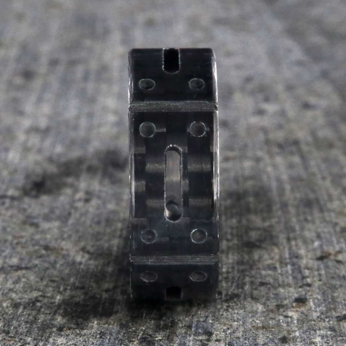 8mm wide black carbon fiber ring with a carved matrix pattern