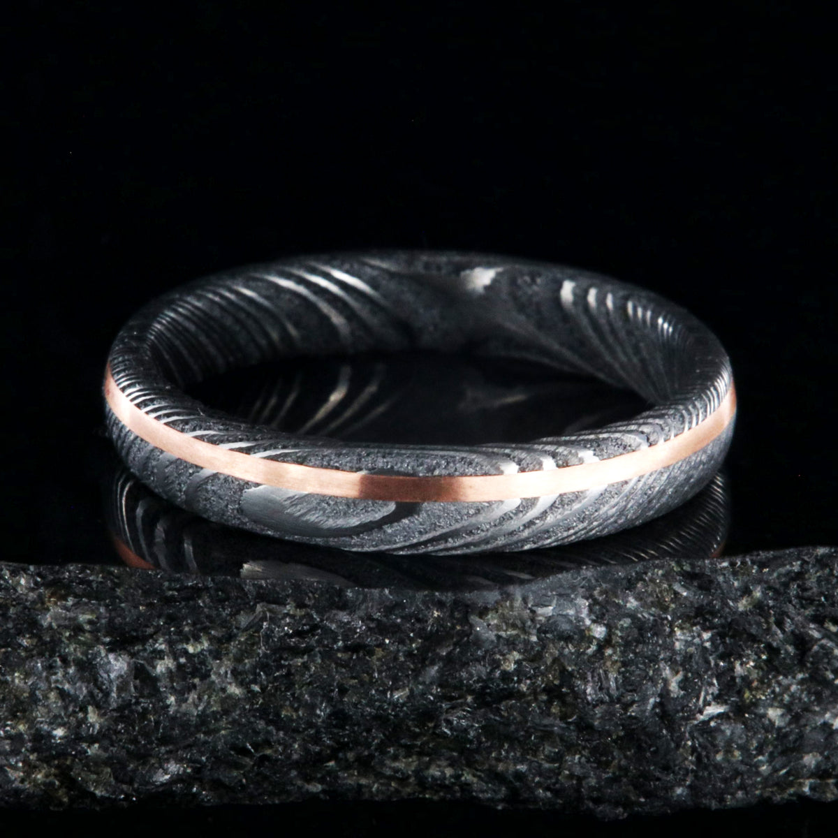 4mm wide Damascus steel ring with copper inlay
